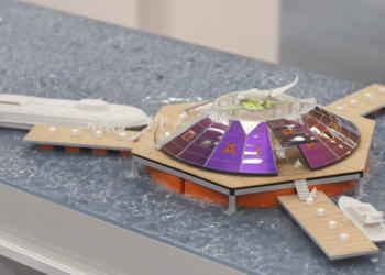 Scale model of an offshore urban-air port concept for air taxi services.