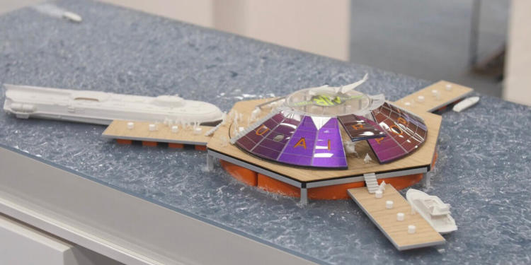 Scale model of an offshore urban-air port concept for air taxi services.