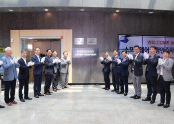 KTR Chairman Jeong Hae-joo (first from the left in the back row) and Director Kim Hyeon-cheol (first from the right in the back row) and other participants are posing with a signboard for the Software Testing and Certification Support Center. (Image credit: KTR)